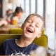 A kid laughing
