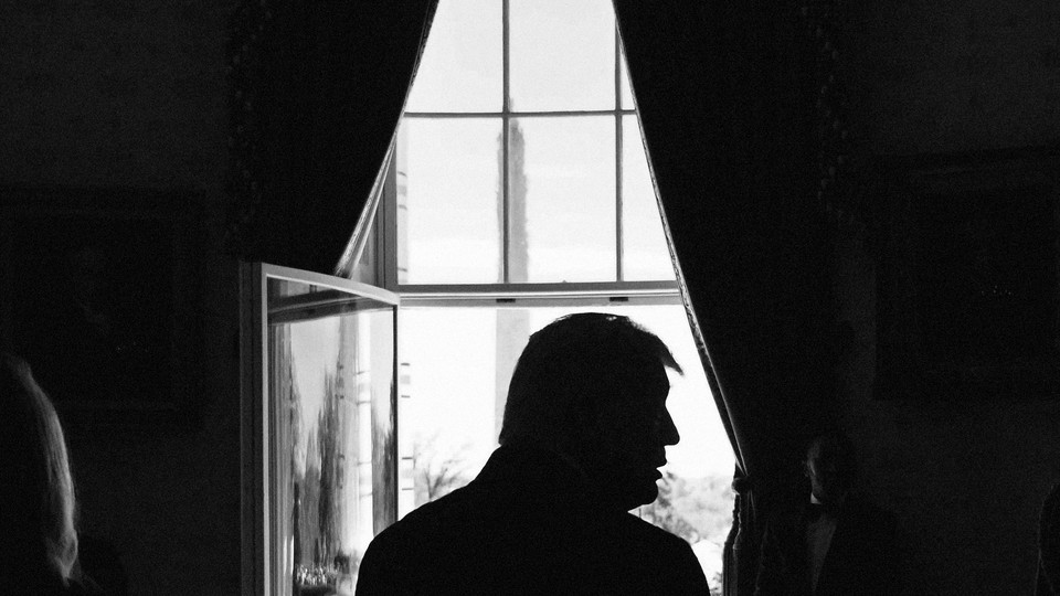 Trump's shadow with Washington Monument behind