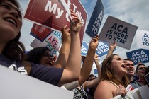 People protesting for the ACA