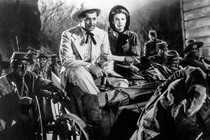 Rhett Butler and Scarlett O’Hara ride through a group of retreating Confederate troops in the 1939 film adaptation of Gone With The Wind