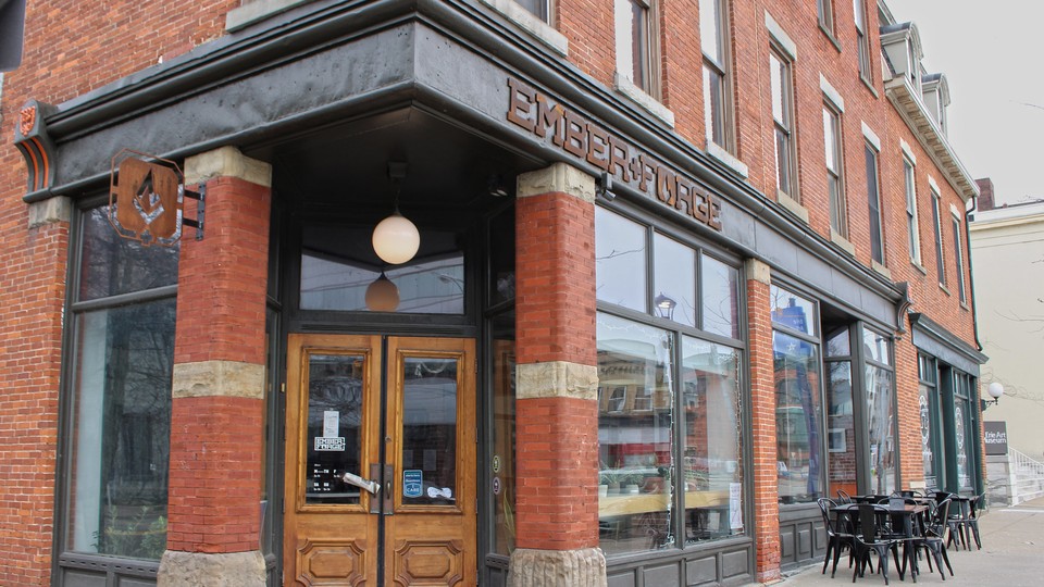 Ember + Forge, a coffee shop that has become a center of downtown life in Erie, Pennsylvania, but whose revenue has virtually disappeared. Small businesses like this have led Erie's downtown revival. A new study examines what it will take for them to survive.