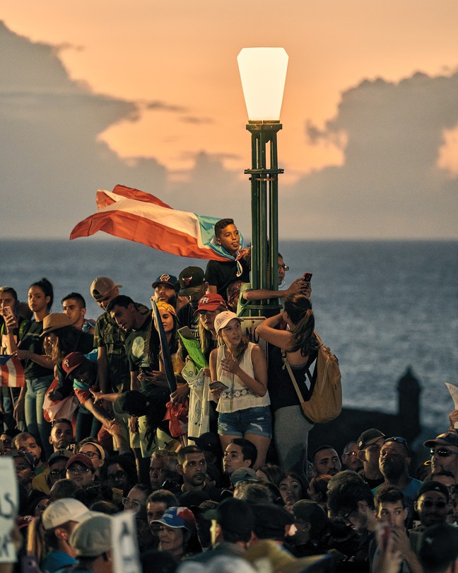 Boy with Puerto Rican flag as cape