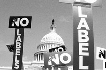 Signs that say "No Labels" in front to the Capitol building