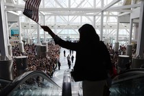 Thousands of people become naturalized citizens at this ceremony in Los Angeles in March.