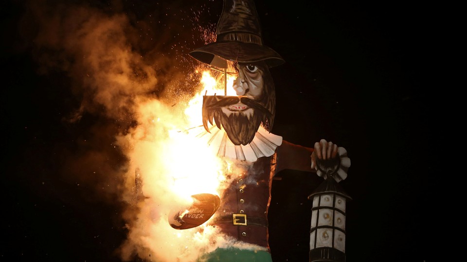 A photo of a burning effigy of Guy Fawkes.
