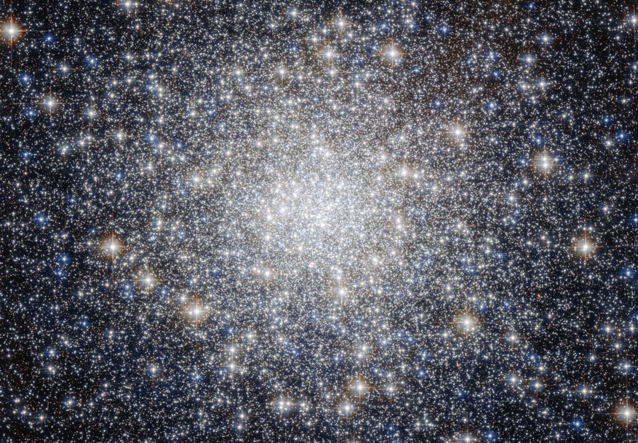 A bright, dense, field of stars, which appears brighter toward the center of the image, indicating a higher density in the middle.