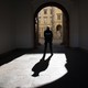 A police officer stands in an archway