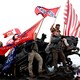 Pro-Trump protesters waving MAGA and Confederate flags at the Capitol