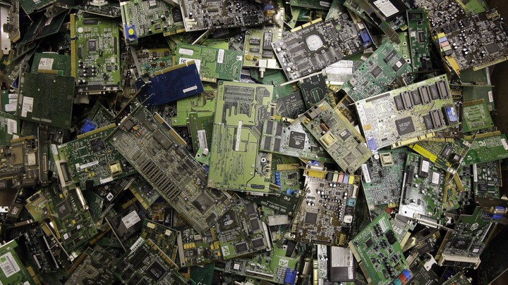 Electronic circuit boards are strewn about.