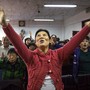 A Chinese Christian woman sings during a prayer service at an underground Protestant church in Beijing.