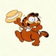Garfield dancing with a hat and cane in his hands
