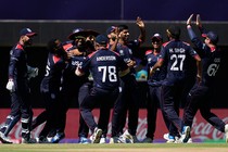 A photo of Team USA celebrating during a game in the T20 Cricket World Cup.