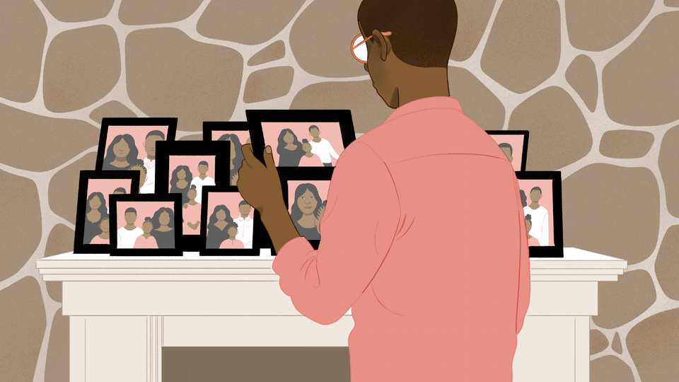 An illustration of a man looking at framed pictures of a family