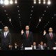 Three representatives, of Google, Facebook, and Twitter, stand with their right hands raised to be sworn in for the Senate Intelligence Committee hearing on Russia's election activity