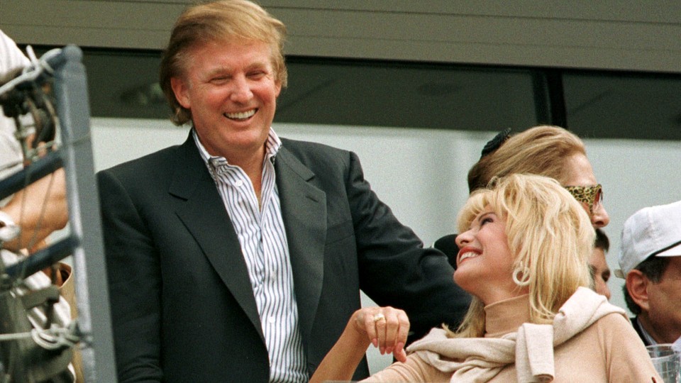 Donald Trump talks with Ivana Trump, his former wife, at the U.S. Open in 1997.
