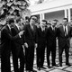 President John F. Kennedy chats with a group of leaders in the Bay of Pigs invasion on Dec. 27, 1962.