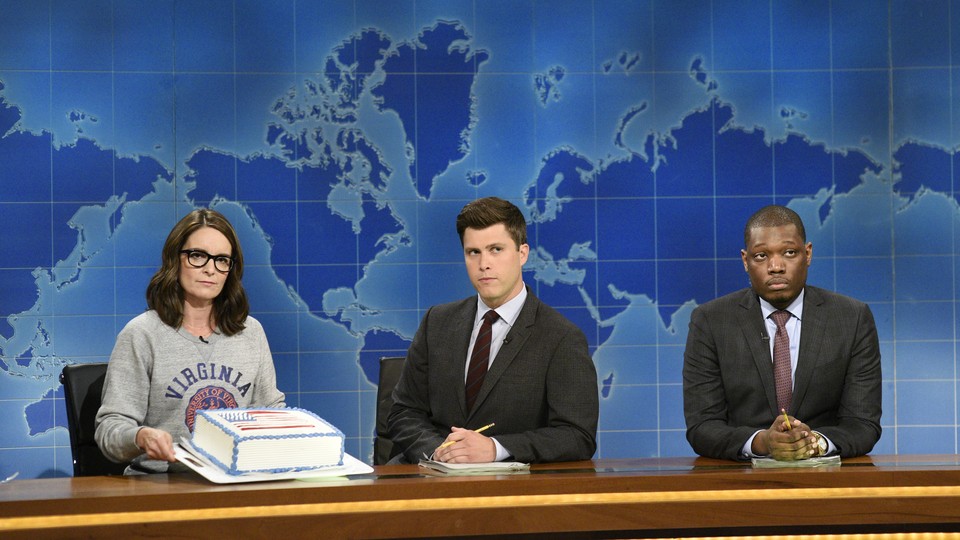 Tina Fey, Colin Jost, and Michael Che during 'Weekend Update: Summer Edition'