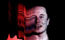 Elon Musk's face distorted on a computer screen