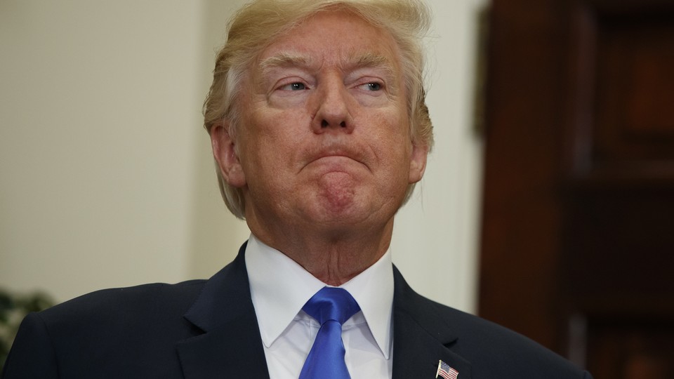 President Trump listens in the Roosevelt Room of the White House.