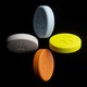 Stimulant medication tablets on a black background