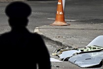 Photo of a dark figure and debris following a drone attack on Moscow