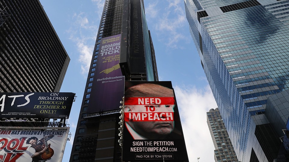 An Impeach Trump billboard in Times Square