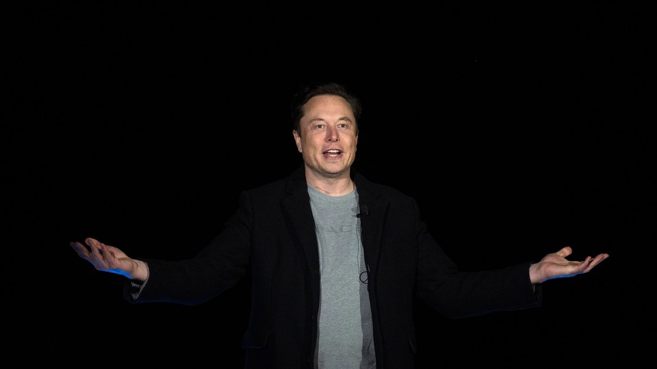 Elon Musk gestures