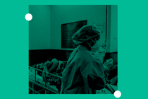 A patient suffering from COVID-19 receives treatment inside the emergency ward at Holy Family hospital in New Delhi