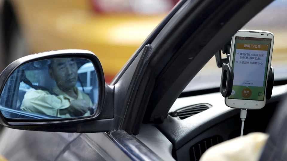 A Didi driver in China uses the app