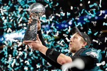 The Philadelphia Eagles' Nick Foles celebrates with the Vince Lombardi Trophy after winning Super Bowl LII