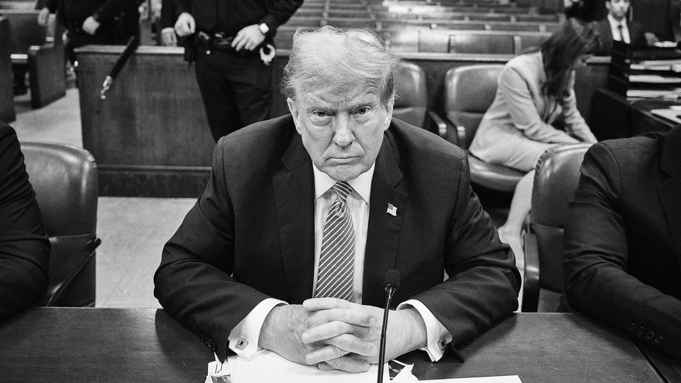 A black-and-white photo of Donald Trump in Manhattan Criminal Court for his trial, on April 19, 2024