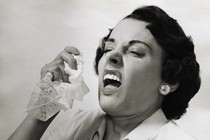 A woman about to sneeze