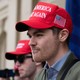 The white-nationalist influencer Nick Fuentes wearing a Make America Great Again hat