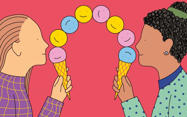 Two friends hold ice cream cones holding piles of smiley faces that connect at the middle.