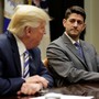 House Speaker Paul Ryan and President Trump sitting at a table during a meeting.