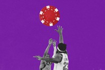 Basketball players reaching for a poker chip