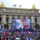 Marine Le Pen delivers a speech on stage during the National Front annual rally honoring Joan of Arc on Place de l'Opera, on May 1, 2015 in Paris, France.