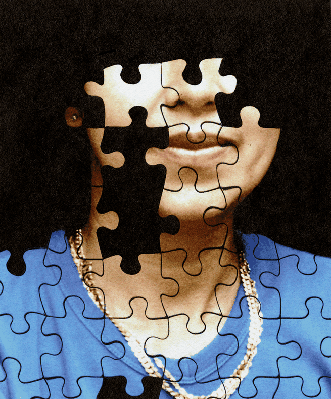 Puzzle pieces of a woman in a blue dress