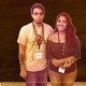 A custom illustration featuring Valentina Love Salas and Ismael Jimenez superimposed on the image of a chalkboard.