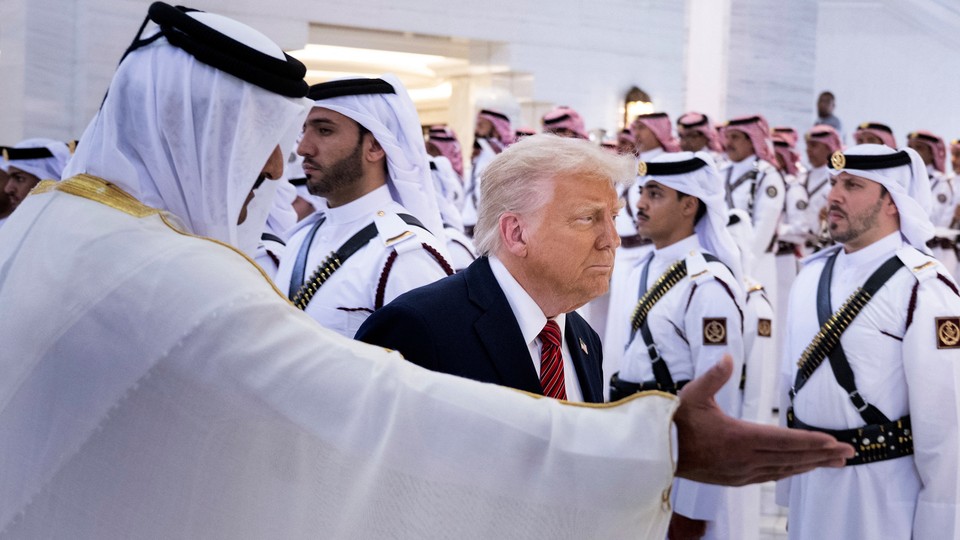 A news photo of Donald Trump at a formal ceremony in the Middle East