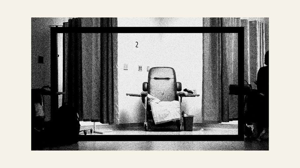 black and white photo of a chair in a doctor's office