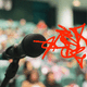 An illustration of a microphone with red scribbles next to it