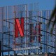 A billboard of the red Netflix 'N' in front of a blue sky