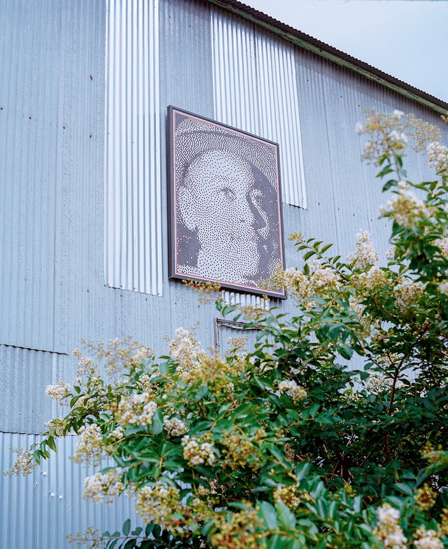 Till’s image on the side of a corrugated-metal building in Glendora, Mississippi