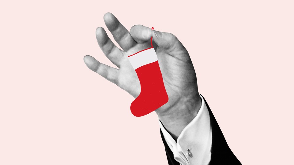 hand holding a christmas stocking