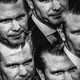 Five duplicated black-and-white photographs of Pete Hegseth’s face that overlap with one another