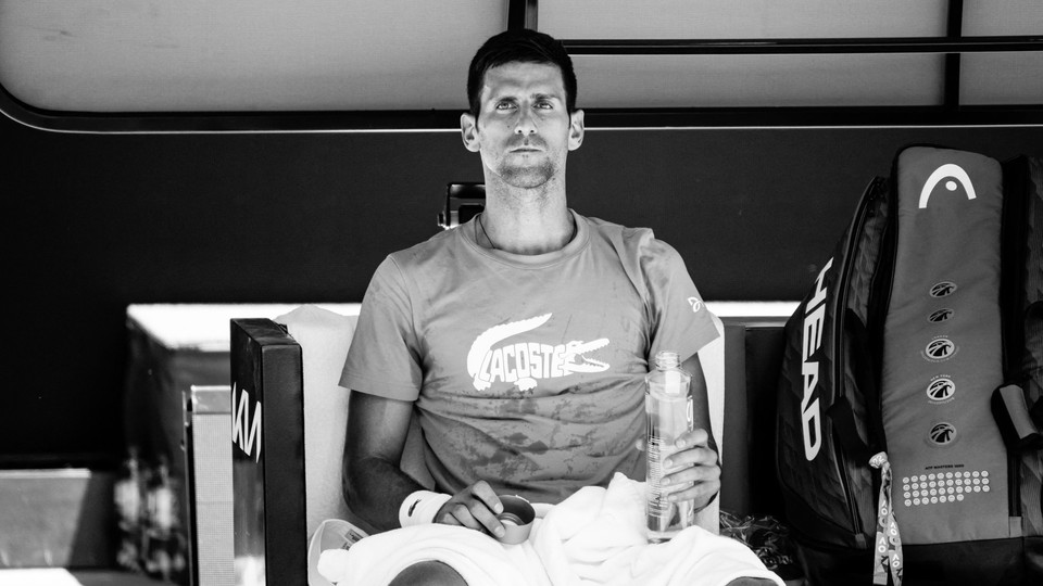 A black-and-white photo of Novak Djokovic