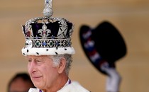 King Charles III, wearing his crown