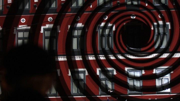 A light show creates the optical illusion of a vortex in Riga, Latvia, in 2014.
