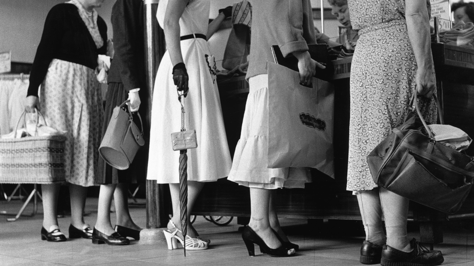 A group of people waiting in line